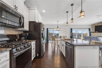 Set along the gorgeous shoreline of Lake of the Ozarks, this on Bayview Golf Course in Missouri - for sale on GolfHomes.com, golf home, golf lot