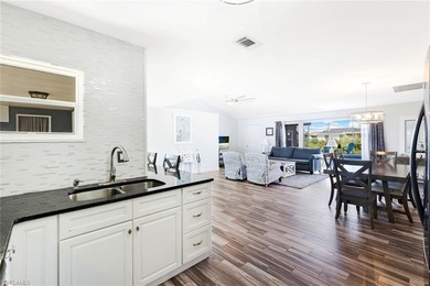 Located in San Carlos Park with NO HOA fees, this versatile on Estero Country Club in Florida - for sale on GolfHomes.com, golf home, golf lot