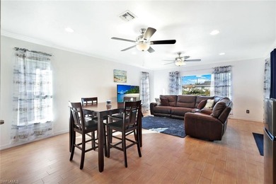 Located in San Carlos Park with NO HOA fees, this versatile on Estero Country Club in Florida - for sale on GolfHomes.com, golf home, golf lot