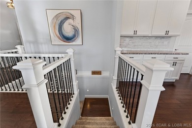 Set along the gorgeous shoreline of Lake of the Ozarks, this on Bayview Golf Course in Missouri - for sale on GolfHomes.com, golf home, golf lot