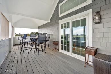 This lovely 3 bedroom 3 bathroom waterfront home was built in on Brick Landing Plantation Yacht and Golf Club in North Carolina - for sale on GolfHomes.com, golf home, golf lot