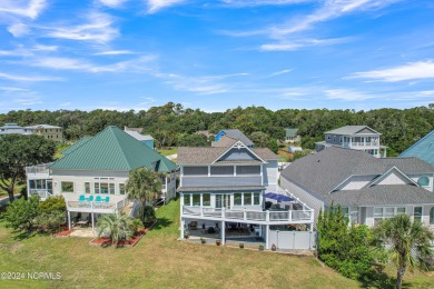 This lovely 3 bedroom 3 bathroom waterfront home was built in on Brick Landing Plantation Yacht and Golf Club in North Carolina - for sale on GolfHomes.com, golf home, golf lot