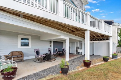 This lovely 3 bedroom 3 bathroom waterfront home was built in on Brick Landing Plantation Yacht and Golf Club in North Carolina - for sale on GolfHomes.com, golf home, golf lot