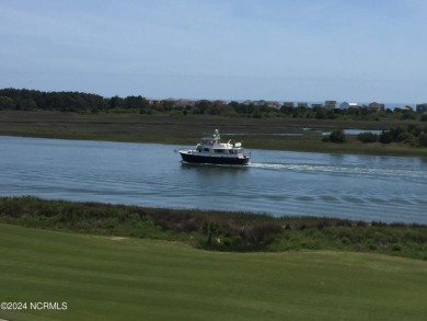 This lovely 3 bedroom 3 bathroom waterfront home was built in on Brick Landing Plantation Yacht and Golf Club in North Carolina - for sale on GolfHomes.com, golf home, golf lot