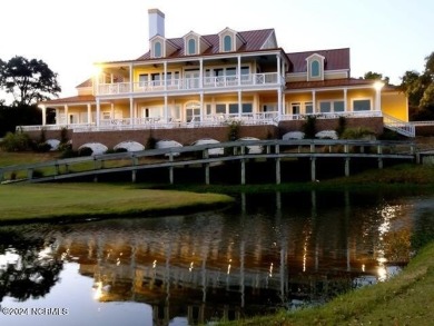 This lovely 3 bedroom 3 bathroom waterfront home was built in on Brick Landing Plantation Yacht and Golf Club in North Carolina - for sale on GolfHomes.com, golf home, golf lot