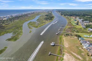 This lovely 3 bedroom 3 bathroom waterfront home was built in on Brick Landing Plantation Yacht and Golf Club in North Carolina - for sale on GolfHomes.com, golf home, golf lot