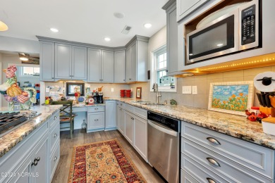 This lovely 3 bedroom 3 bathroom waterfront home was built in on Brick Landing Plantation Yacht and Golf Club in North Carolina - for sale on GolfHomes.com, golf home, golf lot