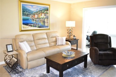 This large ground floor 2/2 is tastefully done and meticulously on Sunrise Lakes Phase IV Golf Course in Florida - for sale on GolfHomes.com, golf home, golf lot