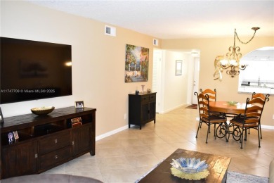 This large ground floor 2/2 is tastefully done and meticulously on Sunrise Lakes Phase IV Golf Course in Florida - for sale on GolfHomes.com, golf home, golf lot