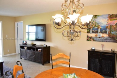 This large ground floor 2/2 is tastefully done and meticulously on Sunrise Lakes Phase IV Golf Course in Florida - for sale on GolfHomes.com, golf home, golf lot