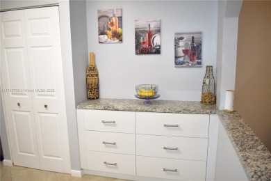 This large ground floor 2/2 is tastefully done and meticulously on Sunrise Lakes Phase IV Golf Course in Florida - for sale on GolfHomes.com, golf home, golf lot