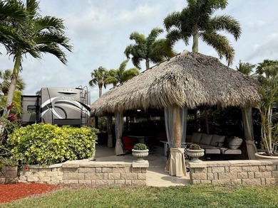 Welcome to paradise, where stunning views and comfort come on St. Lucie Trail Golf Club in Florida - for sale on GolfHomes.com, golf home, golf lot