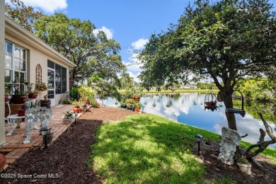 Enjoy stunning water views and abundant natural light in this on Viera East Golf Club in Florida - for sale on GolfHomes.com, golf home, golf lot