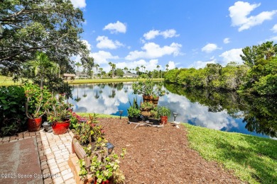 Enjoy stunning water views and abundant natural light in this on Viera East Golf Club in Florida - for sale on GolfHomes.com, golf home, golf lot