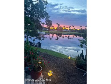 Enjoy stunning water views and abundant natural light in this on Viera East Golf Club in Florida - for sale on GolfHomes.com, golf home, golf lot