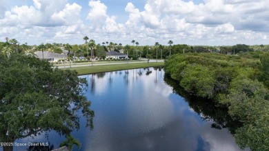 Enjoy stunning water views and abundant natural light in this on Viera East Golf Club in Florida - for sale on GolfHomes.com, golf home, golf lot