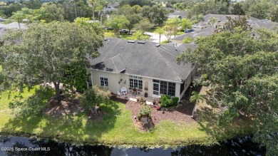 Enjoy stunning water views and abundant natural light in this on Viera East Golf Club in Florida - for sale on GolfHomes.com, golf home, golf lot