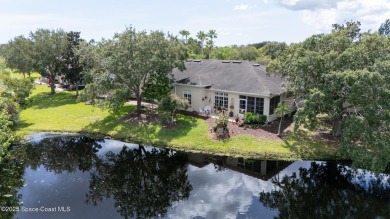 Enjoy stunning water views and abundant natural light in this on Viera East Golf Club in Florida - for sale on GolfHomes.com, golf home, golf lot