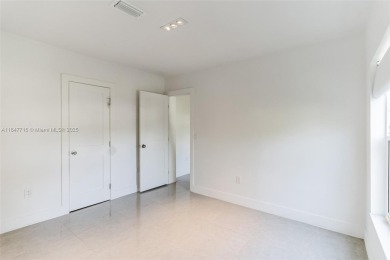 Newly renovated 4 bedroom, 3 bathroom home in the very on Miami Springs Golf and Country Club in Florida - for sale on GolfHomes.com, golf home, golf lot