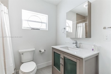 Newly renovated 4 bedroom, 3 bathroom home in the very on Miami Springs Golf and Country Club in Florida - for sale on GolfHomes.com, golf home, golf lot