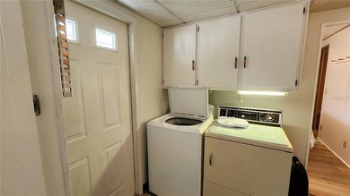 TWO BEDROOM, ONE BATH MOBILE HOME IN ACTIVE 55+ COMMUNITY! This on River Run Golf Links in Florida - for sale on GolfHomes.com, golf home, golf lot