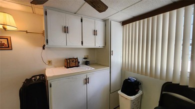 TWO BEDROOM, ONE BATH MOBILE HOME IN ACTIVE 55+ COMMUNITY! This on River Run Golf Links in Florida - for sale on GolfHomes.com, golf home, golf lot