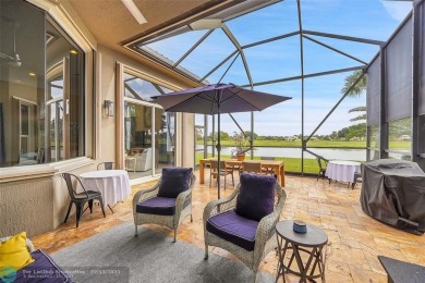 Over $100k of Updates, Impact Glass Windows on the front and on Heron Bay Golf Club in Florida - for sale on GolfHomes.com, golf home, golf lot