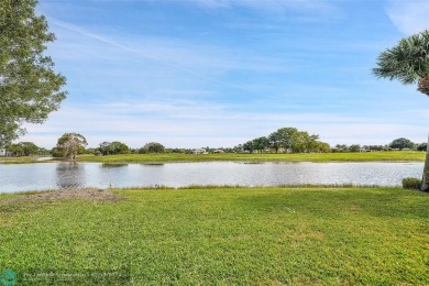 Over $100k of Updates, Impact Glass Windows on the front and on Heron Bay Golf Club in Florida - for sale on GolfHomes.com, golf home, golf lot