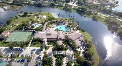 Over $100k of Updates, Impact Glass Windows on the front and on Heron Bay Golf Club in Florida - for sale on GolfHomes.com, golf home, golf lot