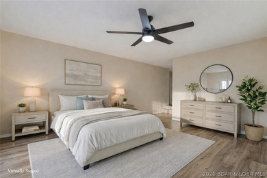 Tastefully updated and beautifully decorated condo at the on Seasons Ridge At Four Seasons in Missouri - for sale on GolfHomes.com, golf home, golf lot
