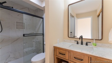 Tastefully updated and beautifully decorated condo at the on Seasons Ridge At Four Seasons in Missouri - for sale on GolfHomes.com, golf home, golf lot