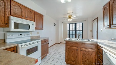 Tastefully updated and beautifully decorated condo at the on Seasons Ridge At Four Seasons in Missouri - for sale on GolfHomes.com, golf home, golf lot