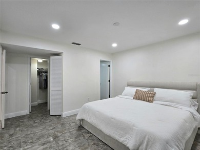 Enjoy Florida's lifestyle at its best in this renovated top on Countryside Country Club in Florida - for sale on GolfHomes.com, golf home, golf lot