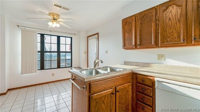 Tastefully updated and beautifully decorated condo at the on Seasons Ridge At Four Seasons in Missouri - for sale on GolfHomes.com, golf home, golf lot