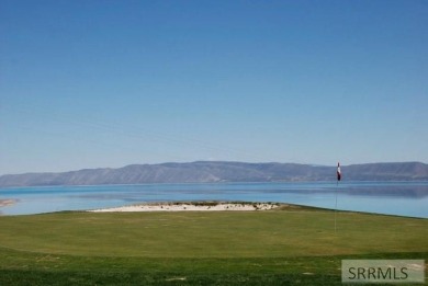 Amazing lake and mountain views from this lot in Fish Haven on Bear Lake West Golf and Country Club in Idaho - for sale on GolfHomes.com, golf home, golf lot