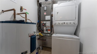 Tastefully updated and beautifully decorated condo at the on Seasons Ridge At Four Seasons in Missouri - for sale on GolfHomes.com, golf home, golf lot