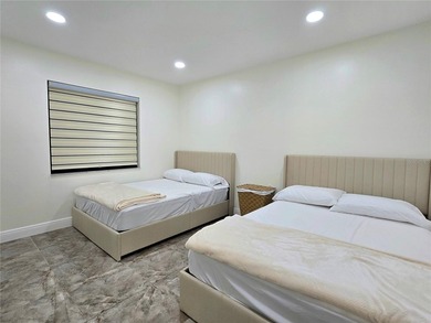 Enjoy Florida's lifestyle at its best in this renovated top on Countryside Country Club in Florida - for sale on GolfHomes.com, golf home, golf lot