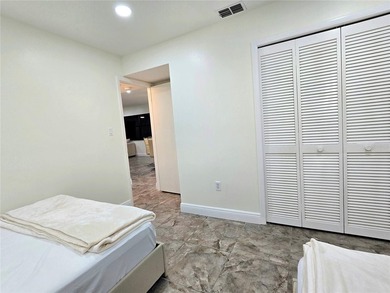 Enjoy Florida's lifestyle at its best in this renovated top on Countryside Country Club in Florida - for sale on GolfHomes.com, golf home, golf lot