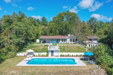 3 BD 2.5 BA 3,145-sq-ft home overlooks tranquil Mill Pond on Spruce Ridge Golf Club in Michigan - for sale on GolfHomes.com, golf home, golf lot