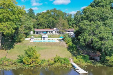 3 BD 2.5 BA 3,145-sq-ft home overlooks tranquil Mill Pond on Spruce Ridge Golf Club in Michigan - for sale on GolfHomes.com, golf home, golf lot