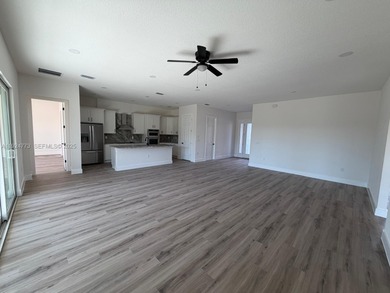 Brand-new house in Placida's sought-after Rotonda Sands on Rotonda Golf and Country Club The Links Course in Florida - for sale on GolfHomes.com, golf home, golf lot