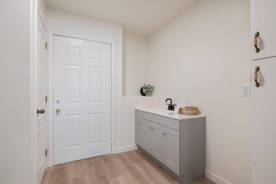 Set in a quiet cul-de-sac next to Bloomington Hills Park and on St. George Golf Course in Utah - for sale on GolfHomes.com, golf home, golf lot