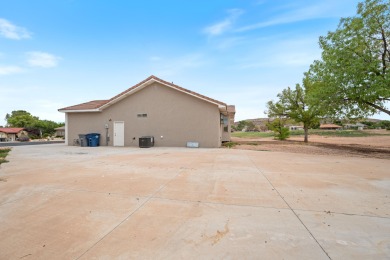 Set in a quiet cul-de-sac next to Bloomington Hills Park and on St. George Golf Course in Utah - for sale on GolfHomes.com, golf home, golf lot