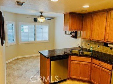 This golf course home is located on the 2nd hole in a gated on Upland Hills Country Club in California - for sale on GolfHomes.com, golf home, golf lot