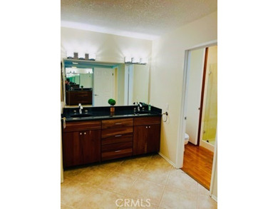 This golf course home is located on the 2nd hole in a gated on Upland Hills Country Club in California - for sale on GolfHomes.com, golf home, golf lot