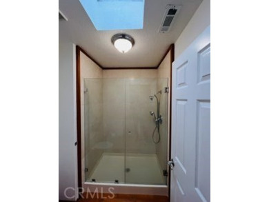 This golf course home is located on the 2nd hole in a gated on Upland Hills Country Club in California - for sale on GolfHomes.com, golf home, golf lot