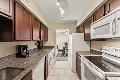 Fully furnished unit offering Strip, golf course, and pool views on Las Vegas Country Club in Nevada - for sale on GolfHomes.com, golf home, golf lot