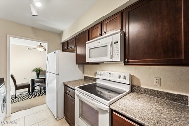 Fully furnished unit offering Strip, golf course, and pool views on Las Vegas Country Club in Nevada - for sale on GolfHomes.com, golf home, golf lot