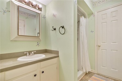 This traditional 4-bedroom, 3-bathroom home overlooks the 2nd on Cobbs Glen Country Club in South Carolina - for sale on GolfHomes.com, golf home, golf lot