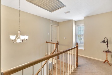 This traditional 4-bedroom, 3-bathroom home overlooks the 2nd on Cobbs Glen Country Club in South Carolina - for sale on GolfHomes.com, golf home, golf lot